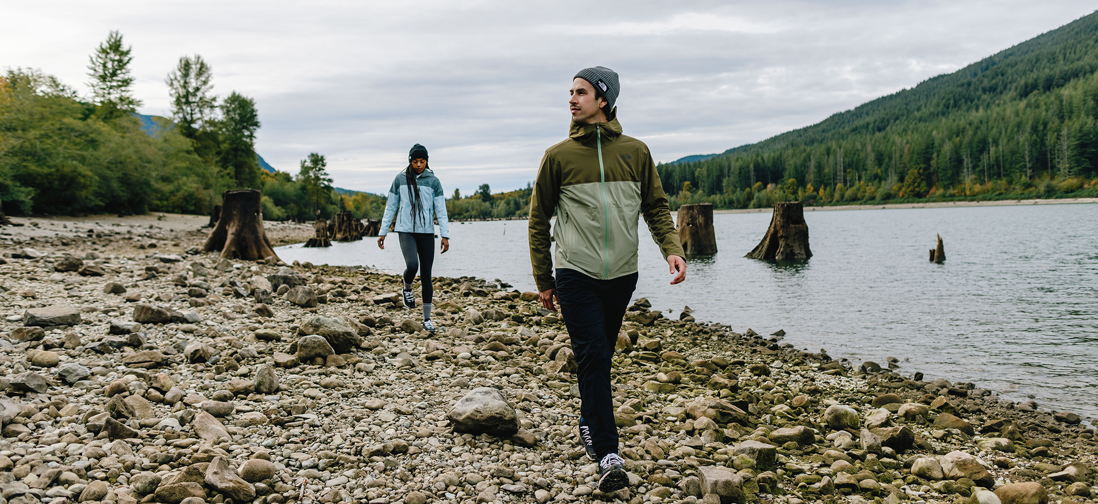 Friends hiking by a lake