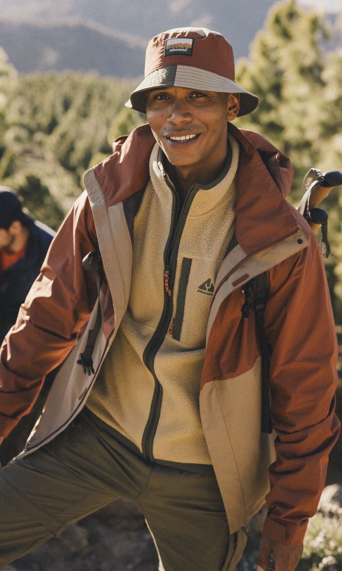 Walker wearing Ayacucho jacket, fleece and hat