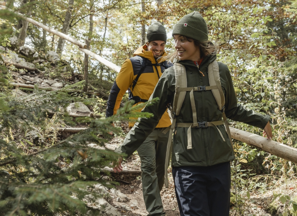 Couple wearing waterproof jackets