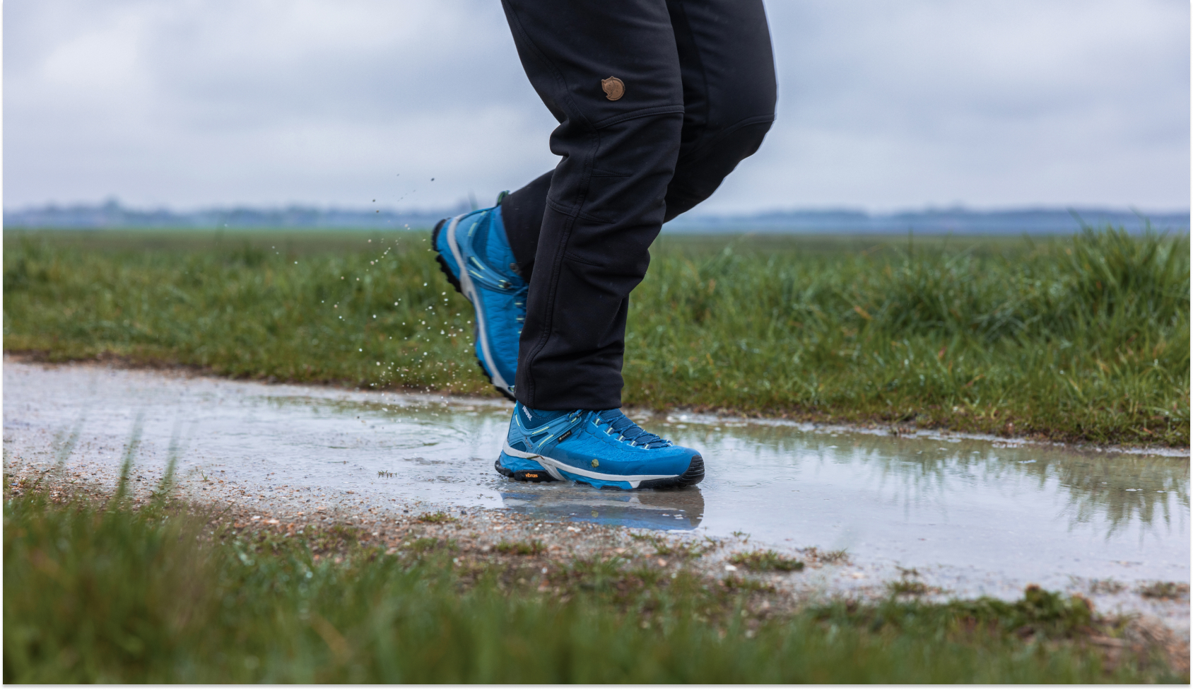 Walker wearing blue Scarpa outside