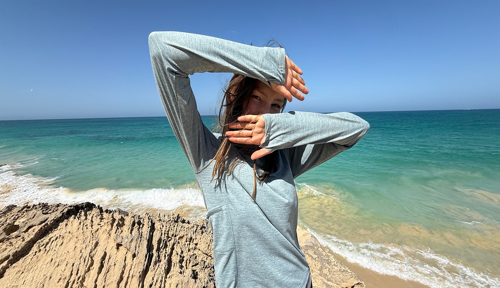 Woman wearing a sun hoodie