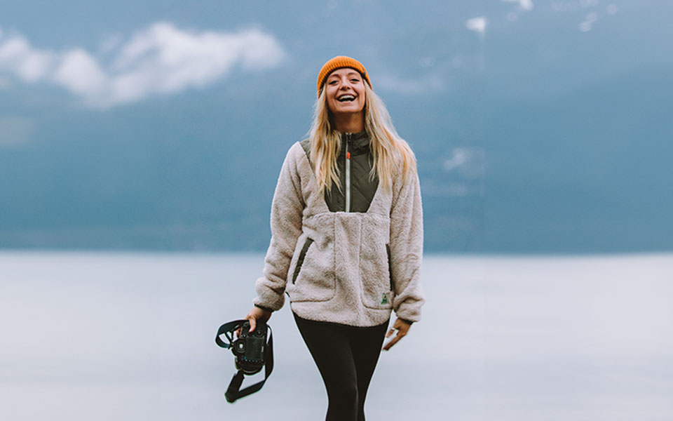 Woman wearing the Beaumont Recycled Sherpa Hooded Fleece