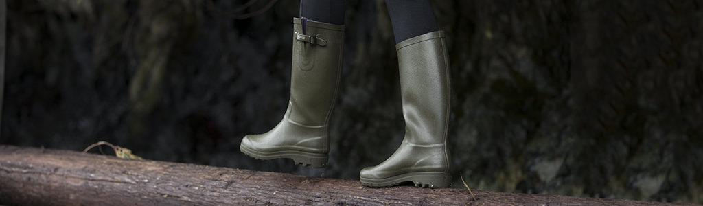 A person wearing wellington boots 