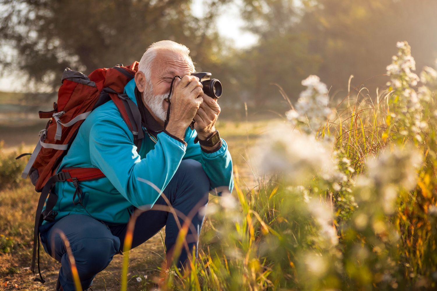 Man taking photos of birds 